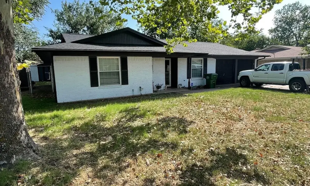Professional roofing crew working on a residential roof in Bluffton